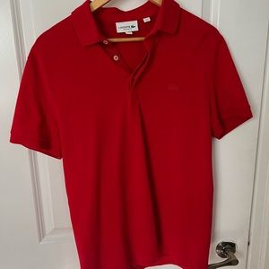 Never worn Lacoste Medium size polo shirt.